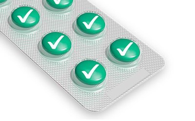 Compendial Testing and Regulatory Guidance A blister pack of green pills, each marked with a white check mark, indicating they are approved or verified.