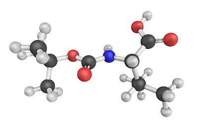 A 3D molecular model showing an arrangement of atoms in various colors representing different elements: white for hydrogen, black for carbon, red for oxygen, and blue for nitrogen. This model is commonly used in chemistry to depict the structure of a molecule, illustrating how atoms are bonded together.