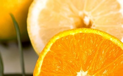 The image is of a half cut orange to indicate Vitamins.